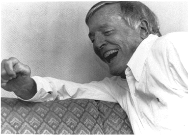 William F. Buckley Jr. laughing